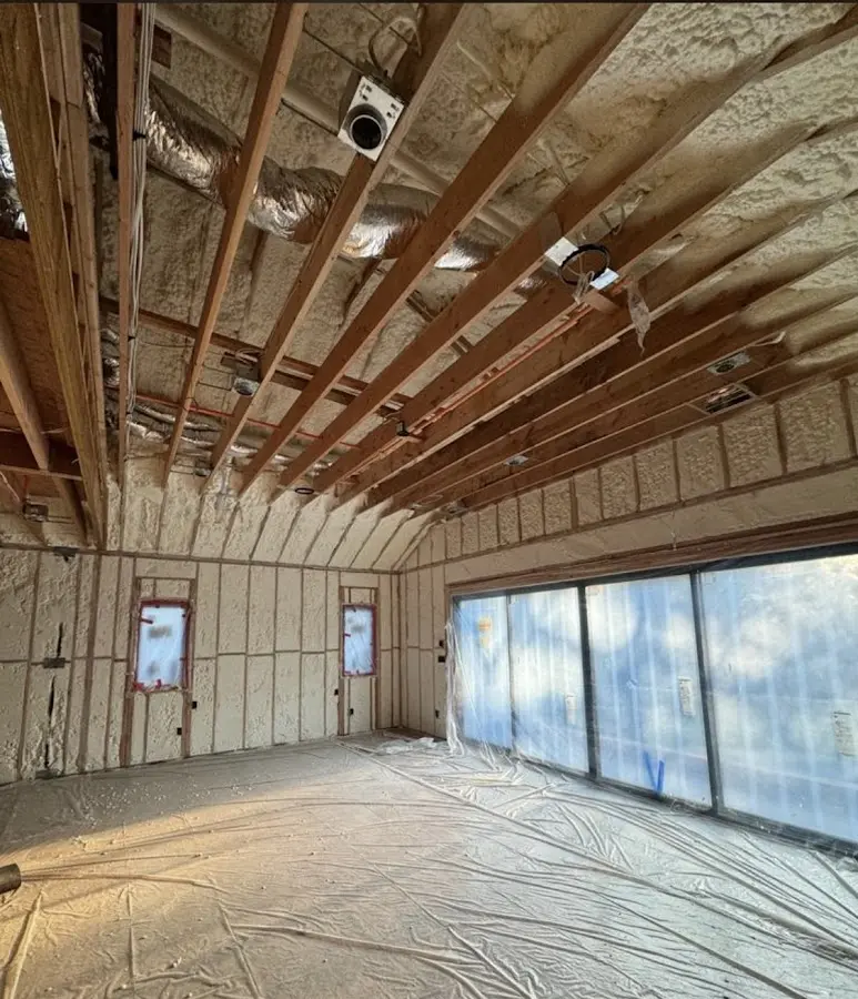 Interior walls and ceiling insulated with spray foam during new construction in Toms River